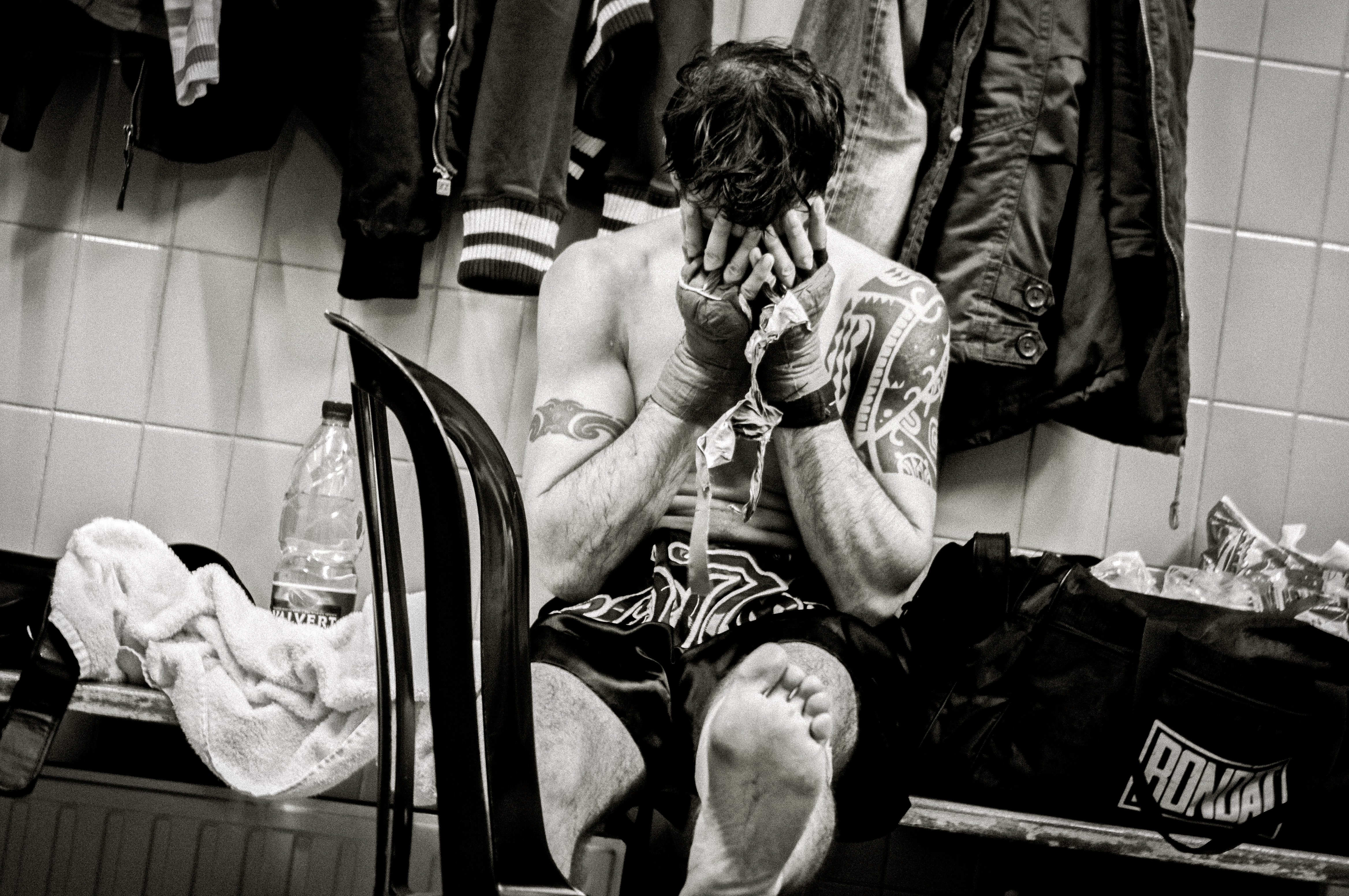 Boxer alone in changing room
