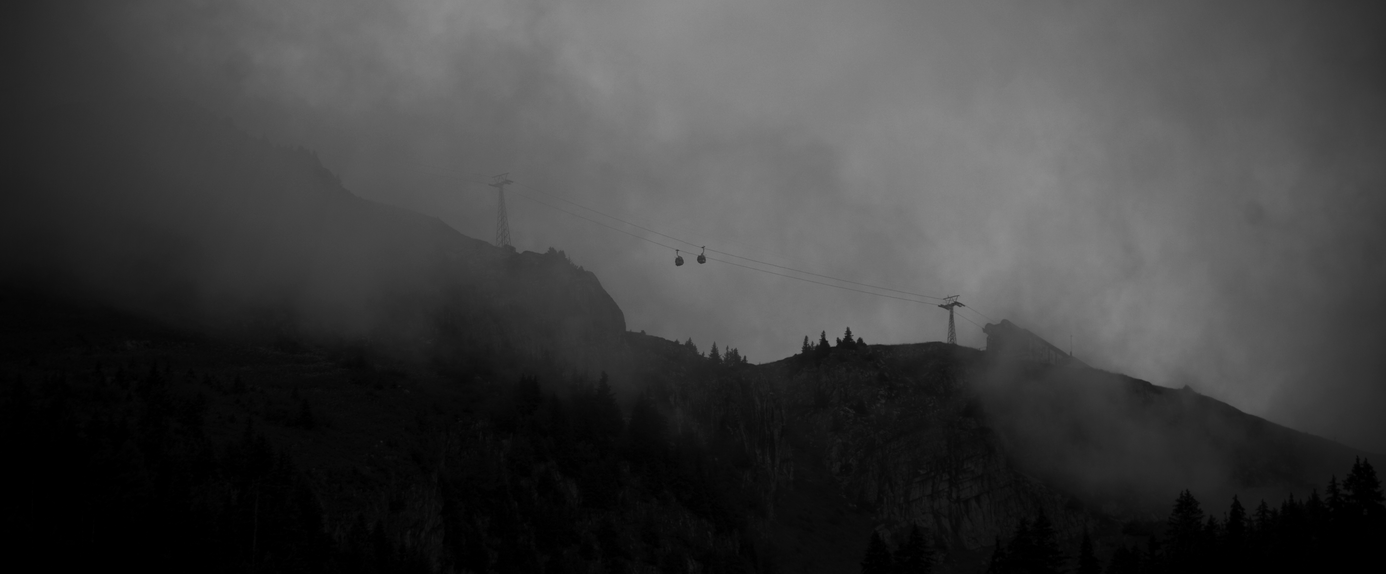 Cable cars in mist