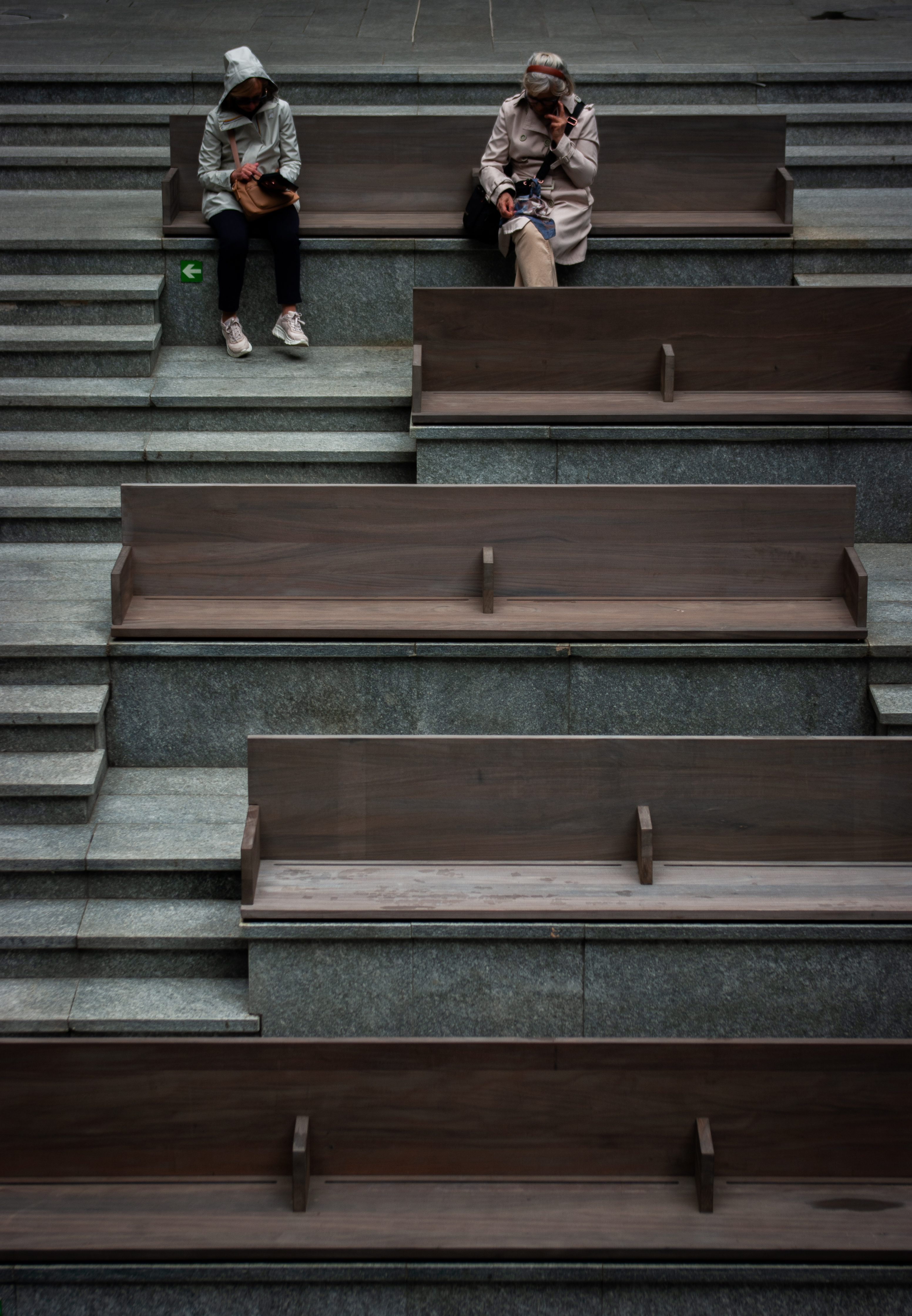 Two women / repeating benches