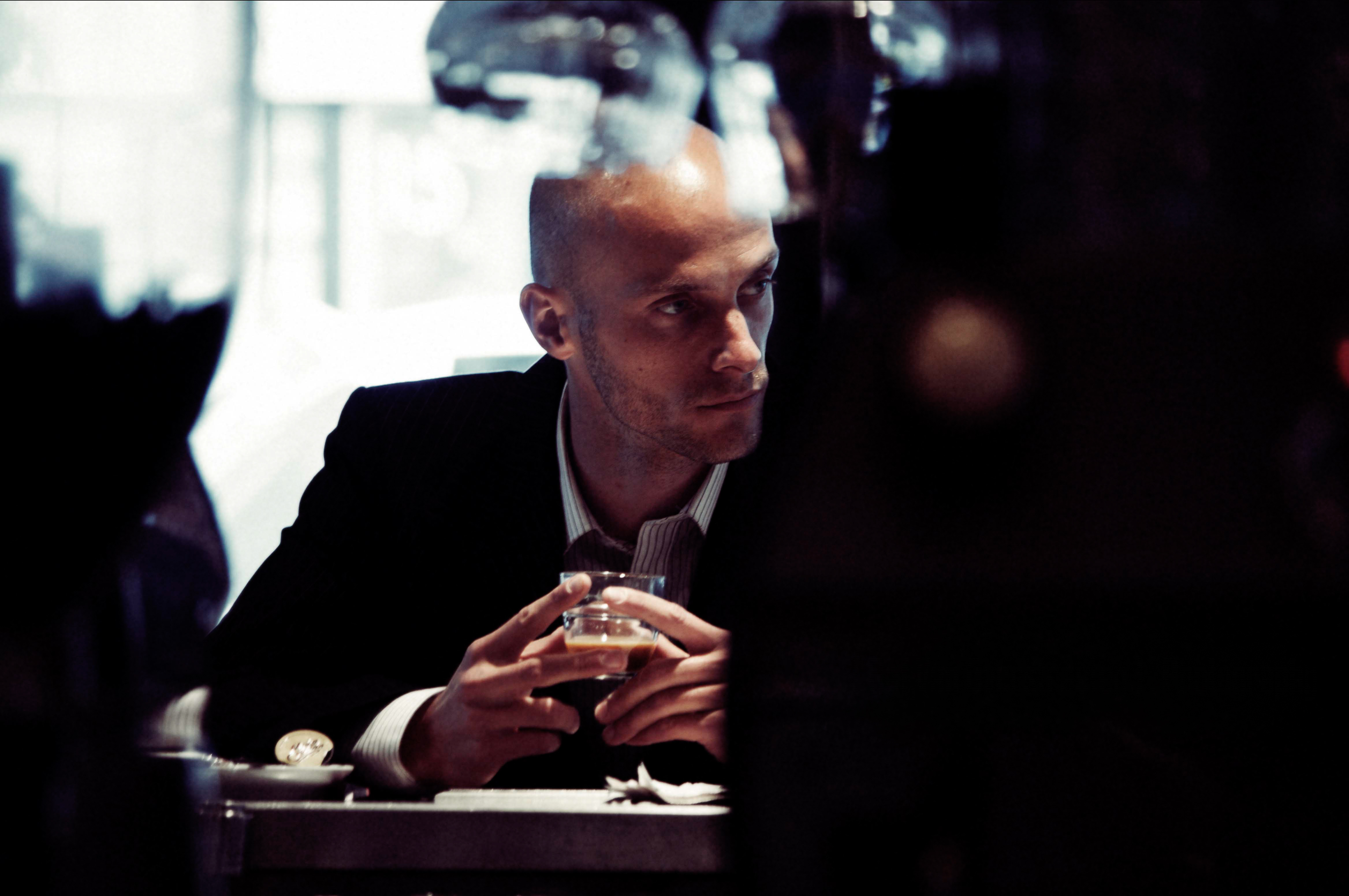 Man with drink / reflections