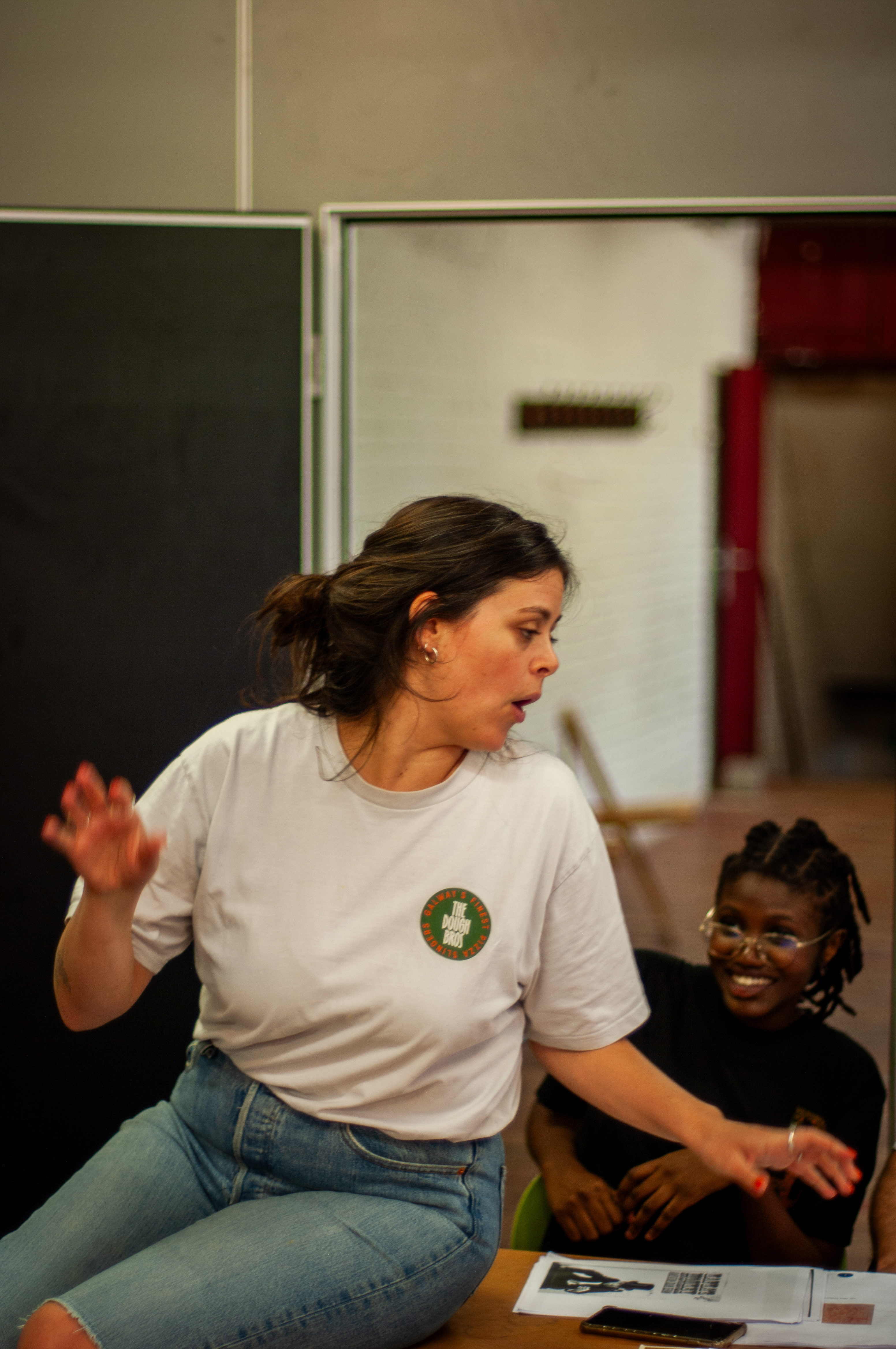 Expressive performer and smiling fellow participant