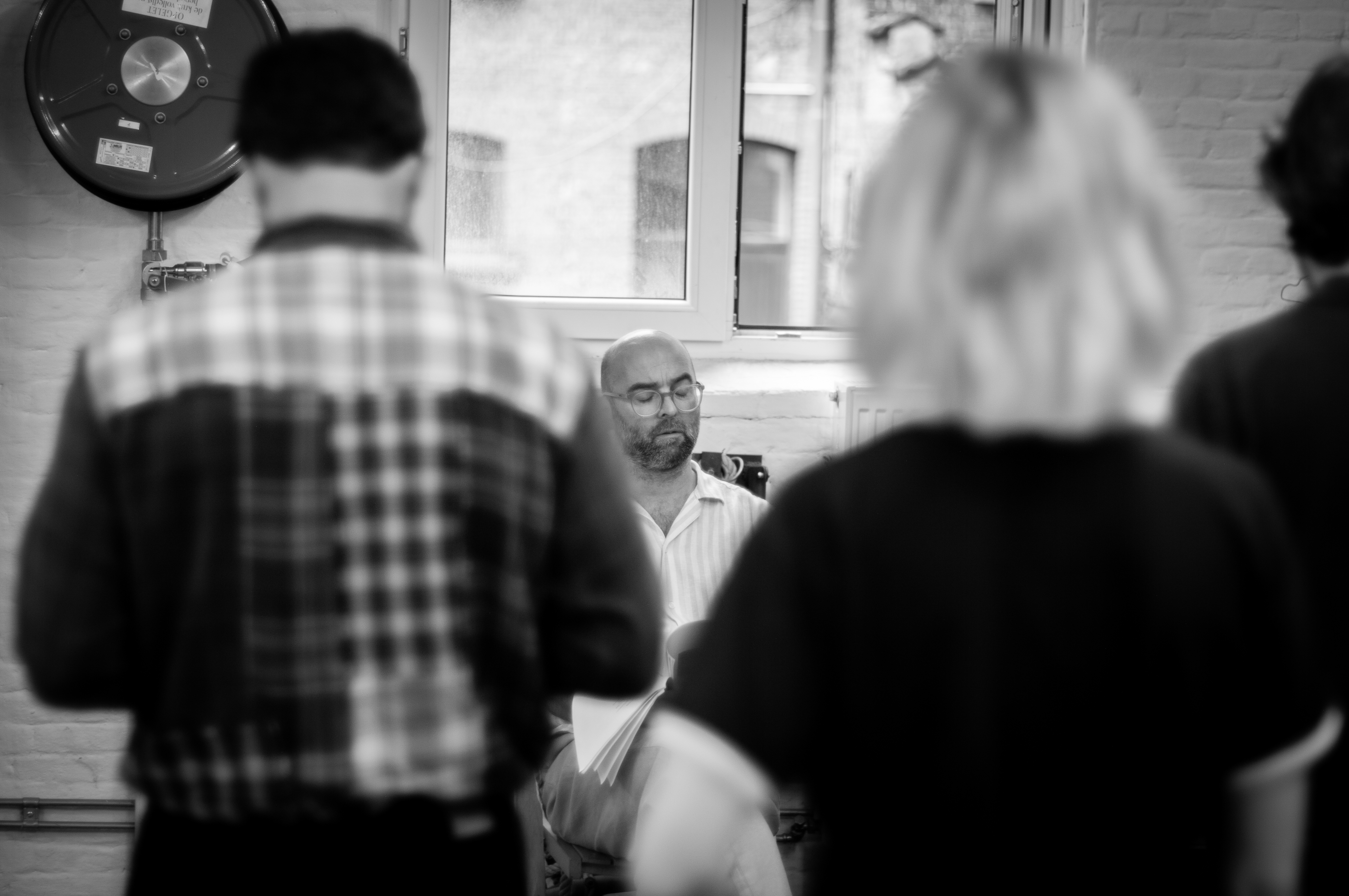 Quiet concentration framed between participants